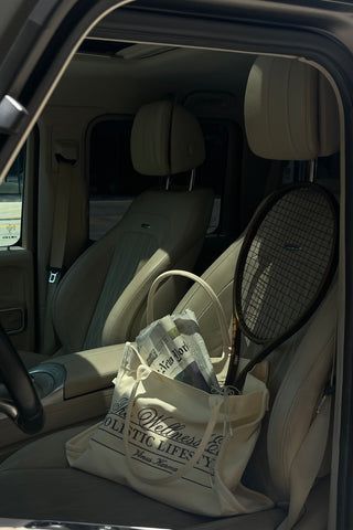 "THE WELLNESS ERA" CREAM TOTE BAG