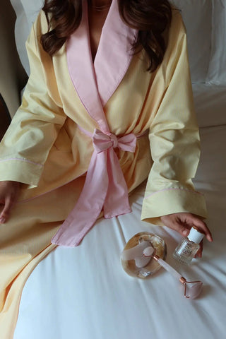Butter Baby Robe - pale yellow cotton robe with pink trim, front view