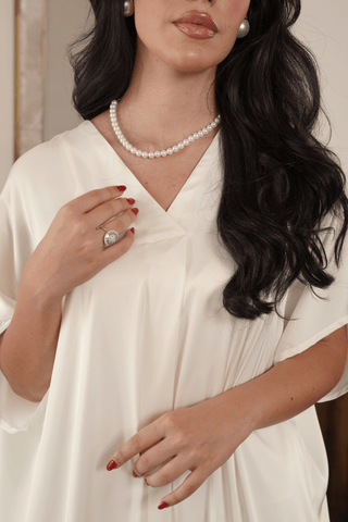 Ivory satin jalabiya with V-neck by Venus Karma