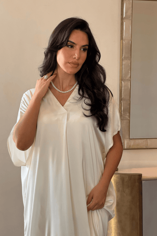 Ivory satin jalabiya with V-neck by Venus Karma
