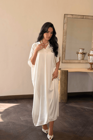 Ivory satin jalabiya with V-neck by Venus Karma