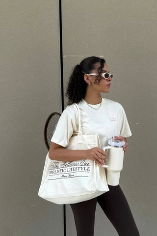 "THE WELLNESS ERA" CREAM TOTE BAG Venus Karma